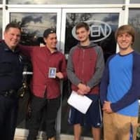<p>Students from Nanuet High School with Clarkstown police officer Frank Negri.</p>