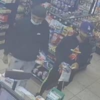 <p>Surveillance footage of the vehicle&#x27;s two passengers</p>