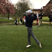 <p>Nolan Forsman, a freshman and leading member of Mamaroneck High School&#x27;s varsity golf team, tees off in a recent match.</p>