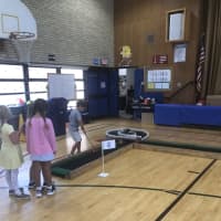 <p>Students practice putting during a North Street School physical education class.</p>