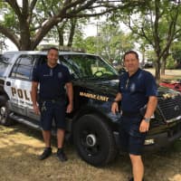 <p>Norwalk Police Department marine officers Rich Delallo and Michael Silva at Saturday&#x27;s Water Safety Day at Calf Pasture Beach.</p>