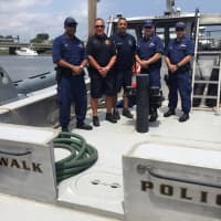 <p>Coast Guard officers are: Andrew Reyes, left; Christopher Azzollini, second from right, and Henry Plante, right. Members of the city&#x27;s Marine Unite are: police Sgt. Pete Lapak, second from left; and Officer Rich Delallo, center.</p>