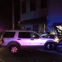 <p>A car crashed into a building at 270 East Ave. in Norwalk late Friday.</p>