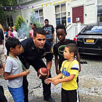 <p>Orangetown officers chatted with local kids at the Back to School BBQ.</p>