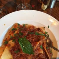 <p>Osteria Romana&#x27;s homemade pappardelle is smothered in a meat-based bolognese sauce.</p>