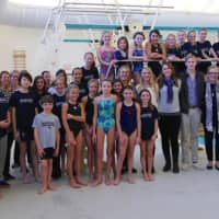 <p>The Powers family poses with YMCA Marlins divers and coaches at the dedication ceremony.</p>