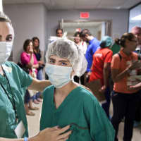 <p>Lisa Lori and her son Zach in Panama at an Operation Smile facility.</p>