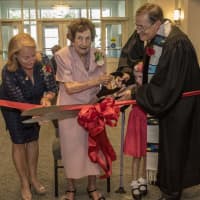 <p>Ribbon Cutting Ceremony for NPC&#x27;s Rededication. Participating: Jean Ann Bolman (Building Committee Vice Chair), Maude Pettus (oldest member at 101), Anna Keehlwetter (best Sunday school 1st grade attendance) and Senior Pastor Sam Schreiner. </p>