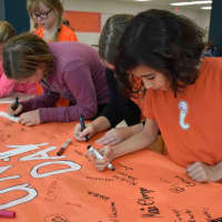<p>Students at Pierre Van Cortlandt Middle School signed an anti- bullying pledge on Unity Day, Oct. 21. </p>