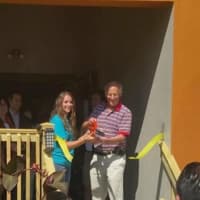 <p>Greenburgh Supervisor Paul Feiner and Paws Crossed CEO Jennifer Angelucci cut the ribbon Saturday at grand opening ceremonies for the new no-kill animal shelter in Elmsford.</p>