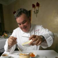 <p>Chef Peter X. Kelly with his Grand Marnier Soufflé.</p>