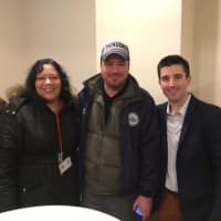 <p>Chris Petsas, a Poughkeepsie city councilman, center, with Natasha Cherry, left, chairwoman of the Common Council, and local businessman Mike Lund, who renovated 36 Gifford St., attend the open house and ribbon cutting in January.</p>