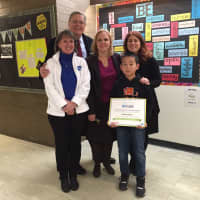 <p>Stamford fifth-grader Brian Chen, right, is congratulated by (l-r) Pfizer scientist Rosemary Orciari, Stamford Mayor David Martin, school principal Amy Beldotti, and teacher Leigh Ann Mobarik.</p>