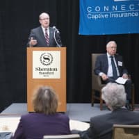 <p>Sen. Kevin Kelly speaks to the Connecticut Captive Insurance Association at the Annual Captive Insurance Symposium Oct. 13.</p>