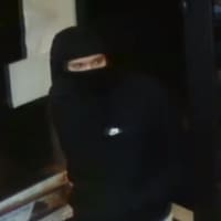 <p>Investigators are searching for a suspect who is accused of robbing a Preston gas station at gunpoint.</p>