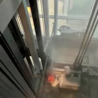 <p>The fire broke out on top of an elevator.</p>