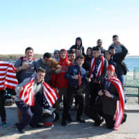 <p>Stepinac High School students warm up after the Westchester Polar Plunge at Glen Island Park in New Rochelle. Water in the Long Island Sound this time of year is a balmy 50 degrees.</p>