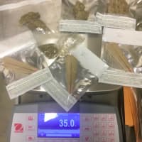 <p>Pre-rolled joints and prepackaged marijuana recovered at the scene</p>