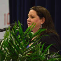 <p>Principal Stacy Butkus speaks at at the Abbott Tech High School graduation.</p>