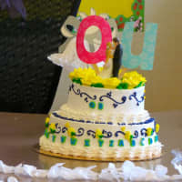 <p>A cake was made for a mock wedding at Increase Miller Elementary School of the letters &quot;Q&quot; and &quot;U.&quot;</p>
