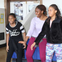 <p>Richard J. Bailey students dance with the Dance Theatre of Harlem while learning about black history.</p>