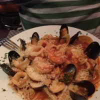 <p>Calamari, mussels and shrimp are piled atop pasta at Ragazzi, known for its generous portions.</p>