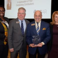 <p>From left, Dorothy Botsoe, president of the Hudson Gateway Association of Realtors with HGAR CEO Richard Haggerty[ Barry Kramer, 2017 HGAR “Realtor of the Year;” and Terri Crozier, HGAR Recognition Committee Chair.</p>