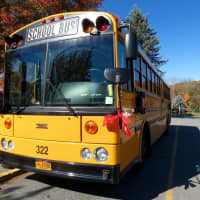 <p>Katonah-Lewisboro school buses displayed red ribbons.</p>