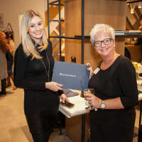 <p>Reina Sutch, left, and Rose Aglieco attend the grand opening.</p>