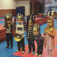 <p>Kids from The Renaissance Child create Pharaoh Hats for their lesson on ancient Egypt.</p>