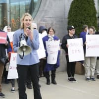 <p>Rep. Caroline Simmons (D-Stamford) attends a rally at the Stamford courthouse on Wednesday in support of immigrants&#x27; rights.</p>