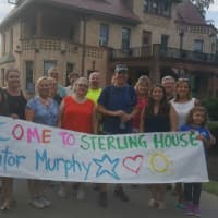 <p>A crowd greets U.S. Sen. Chris Murphy as he arrives late Thursday afternoon at the Sterling House Community Center in Stratford.</p>