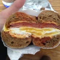 <p>The artfully crafted THC with SPK (that&#x27;s a Taylor ham and cheese with salt, pepper and ketchup) served on a toasty whole wheat bagel at River Road Hot Bagels in Fair Lawn.</p>