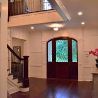 <p>The two story entryway at  85 Indian Head Road in Riverside is inviting and elegant.</p>