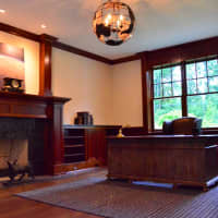 <p>The home contains an office, several fireplaces and large windows in nearly every room.</p>