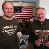 <p>Rob and Bob Skead with copies of their books.</p>