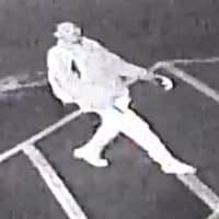 <p>Police have released photos of an armed suspect who stole a woman’s car at Whole Foods on Long Island, police said.</p>