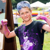 <p>Ryan Flockhart, 10, of East Setauket, traveled to Mahopac to get his hands dirty in memory of his cousin Ty Louis Campbell.</p>