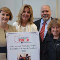 <p>Left to right: Director of Housing, Health and Human Services Center Julia Orlando, President of Ridgewood Moving Cynthia
Myer, District Director of Westy Self Storage Tim Mincin,and Cynthia W. Massarsky.</p>