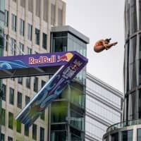 <p>Xantheia Pennisi of Australia dives from the 21 meter platform during the training day for the first stop of the Red Bull Cliff Diving World Series at Boston on June 2, 2022.</p>