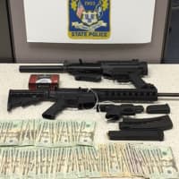 <p>State police seized firearms, narcotics and cash in the bust.</p>