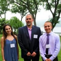 <p>Chris Graziano (center), vice president of SUEZ operations in New York, with Lindsey Aprahamian of Clarkstown South High School and Matthew Wain of Nanuet Senior High School, who each won $3,000 SUEZ-NAWC college scholarships.</p>
