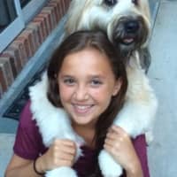 <p>Samantha rescued her 50-pound Wheaton Terrier from drowning</p>