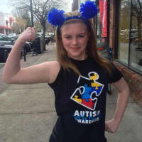 <p>Samantha Peck showing support for Autism Awareness</p>