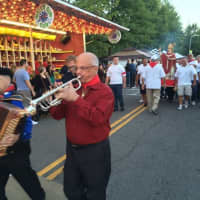<p>Musicians lead the procession with the statue of Saint Gennaro in Yorktown at last year&#x27;s fest.</p>