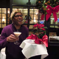 <p>Alvin Clayton, owner of Alvin &amp; Friends in New Rochelle, gets into the holiday spirit with the eatery&#x27;s Cinnamon Crunch cocktail.</p>