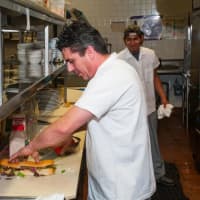 <p>Sapore Steakhouse&#x27;s head chef prepares lunch at the Fishkill eatery.</p>