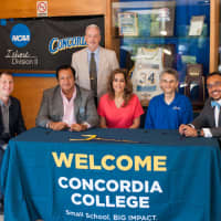 <p>Coach Brian Sondey, CACC Commissioner Dan Mara, Dr. Martin and Samia Sayegh, Athletics Director Ivan Marquez, and Concordia New York President, Rev. John Nunes, Ph.D. at the endowment agreement signing in Bronxville.</p>