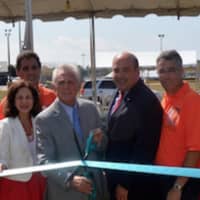 <p>Mayor Harry Rilling is joined by others at the ribbon-cutting for the Norwalk Oyster Festival. See next photo for full IDs. </p>