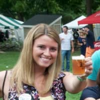 <p>A beer lover toasts the brews from some of America&#x27;s best craft breweries at America On Tap on Saturday at Ives Concert Park in Danbury.</p>